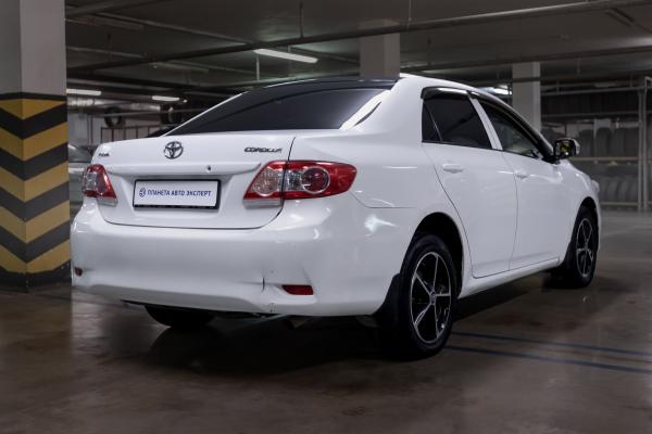 Toyota Corolla 1.6 MT (124 л.с.) 2013