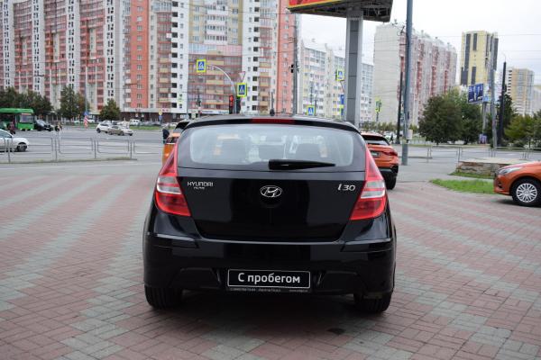 Hyundai i30 1.6 AT (126 л.с.) 2011