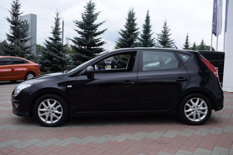 Hyundai i30 1.6 AT (126 л.с.) 2011