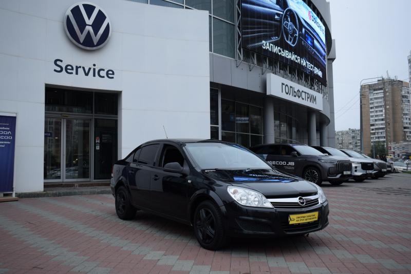 Opel Astra 1.6 MT (115 л.с.) 2012