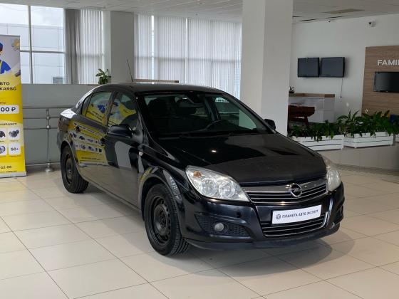 Opel Astra 1.6 MT (115 л.с.) 2011