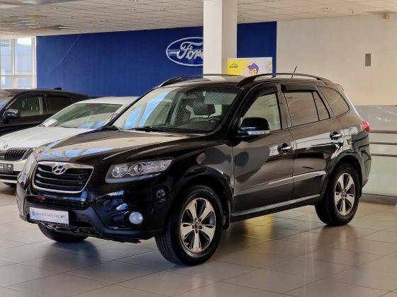 Hyundai Santa Fe 2.2d AT (197 л.с.) 4WD 2011