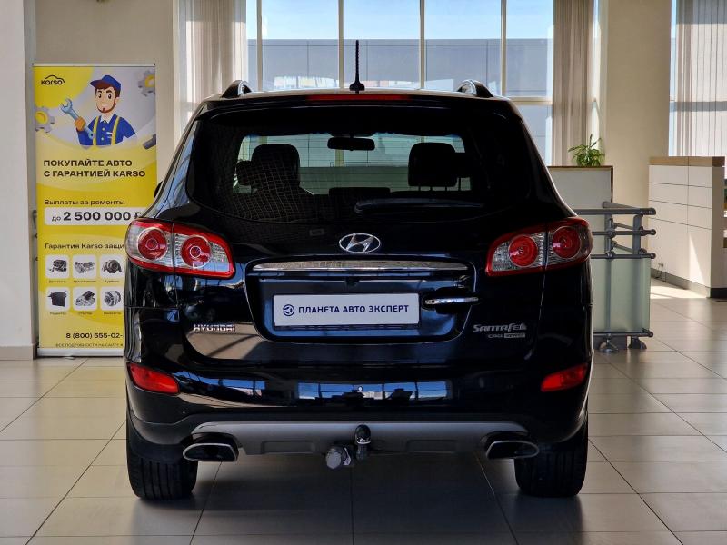 Hyundai Santa Fe 2.2d AT (197 л.с.) 4WD 2011