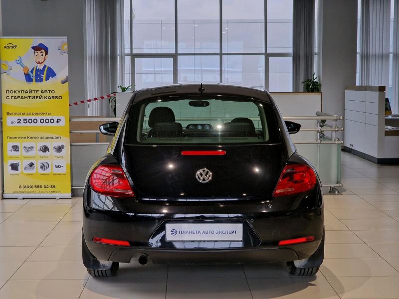 Volkswagen Beetle 1.2 AMT (105 л.с.) 2013