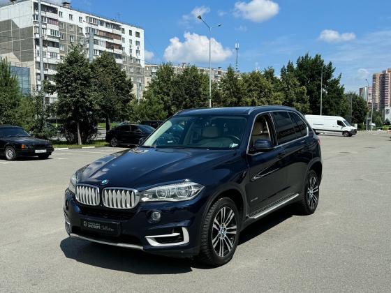 BMW X5 50i 50i 4.4 AT (450 л.с.) 4WD 2014