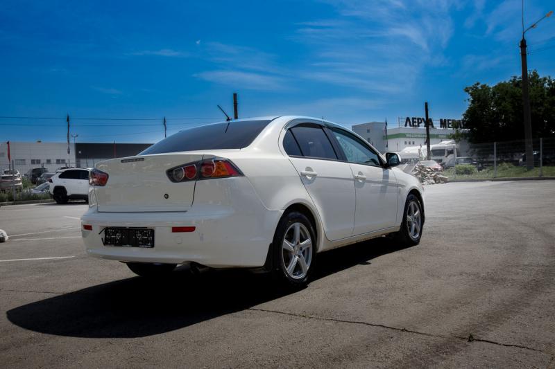 Mitsubishi Lancer 1.6 AT (117 л.с.) 2011