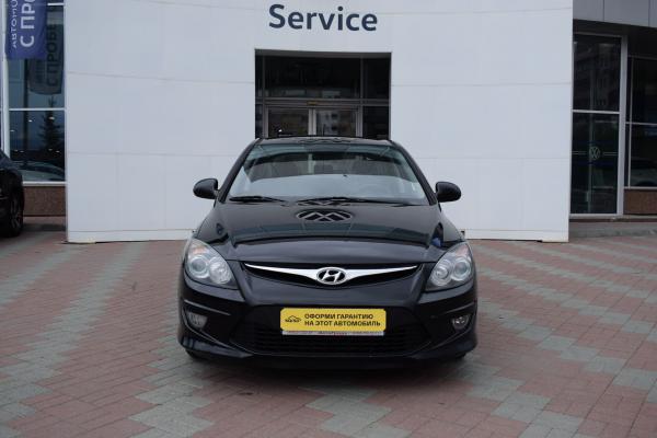 Hyundai i30 1.6 AT (126 л.с.) 2011