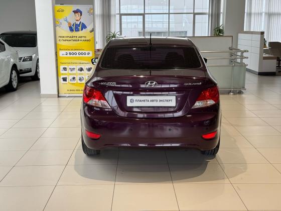 Hyundai Solaris 1.4 AT (107 л.с.) 2012